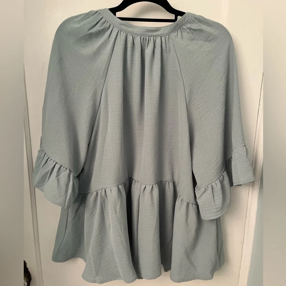 Torrid Raglan Ruffle Peplum Top - Picture 9 of 10